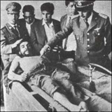 Che lies dead